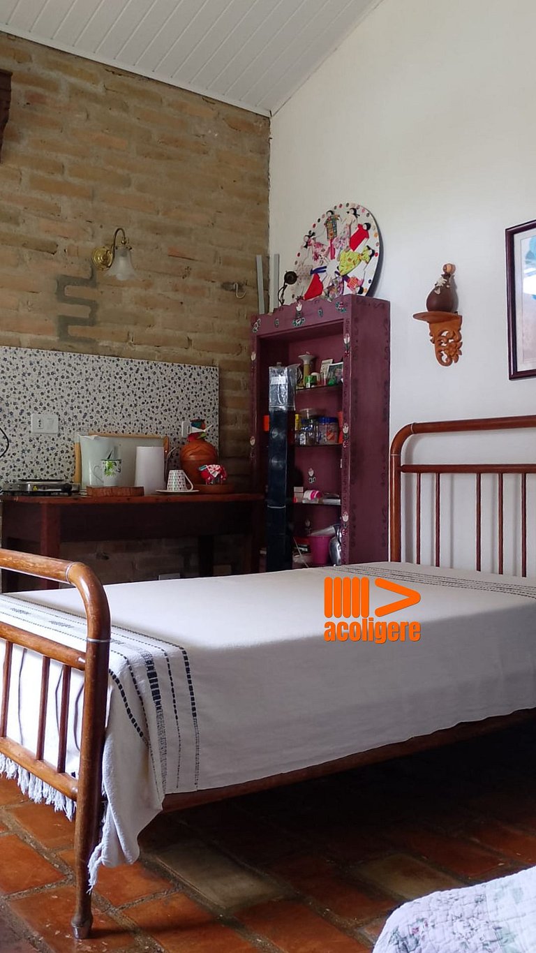 Casa de Meg Suíte 3 c varanda e vista para o verde